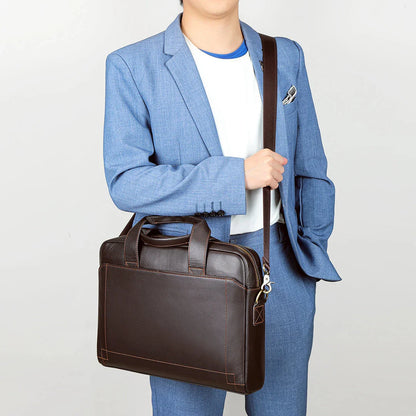 Men's genuine leather briefcase in dark coffee colour, featuring a spacious interior and adjustable shoulder strap for versatile carrying