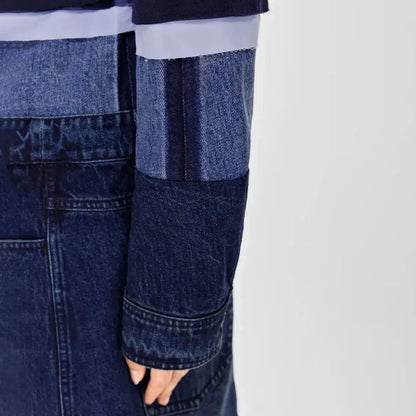 A stylish patchwork denim trench coat with a classic silhouette and a modern edge, perfect for the autumn and winter seasons.