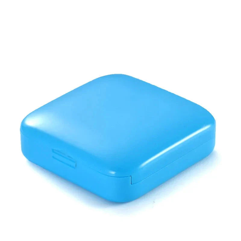 Compact and portable 2-grid mini pill box made of durable ABS plastic for organised medication storage