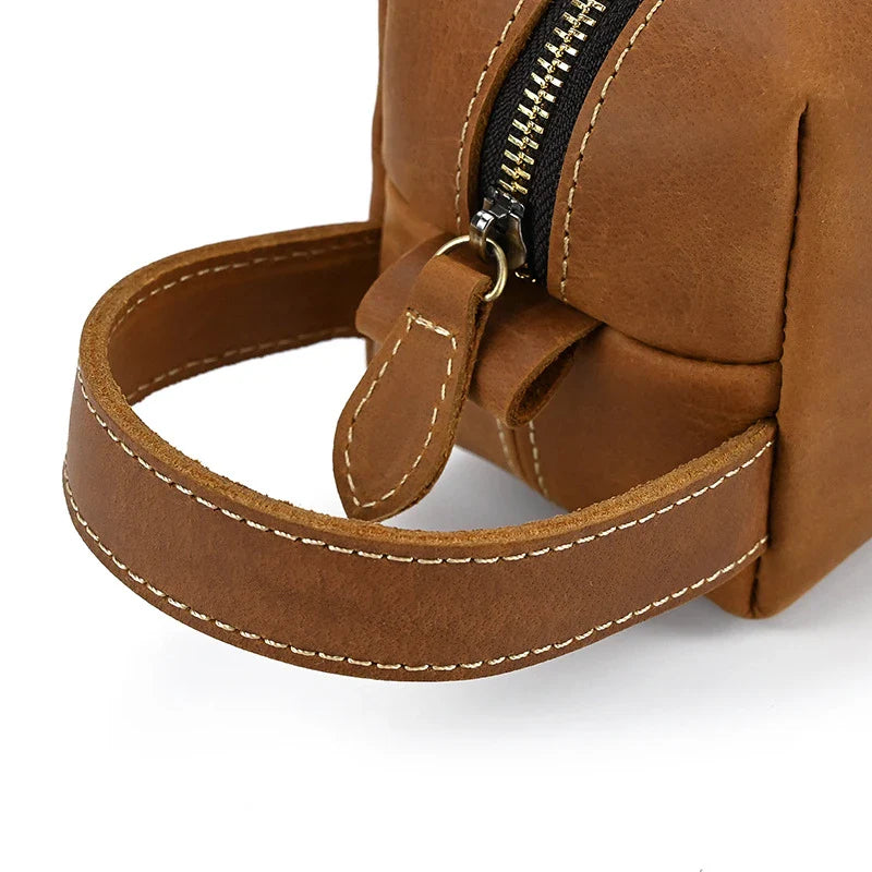 Premium leather clutch bag with multiple interior pockets, designed for the sophisticated British gentleman