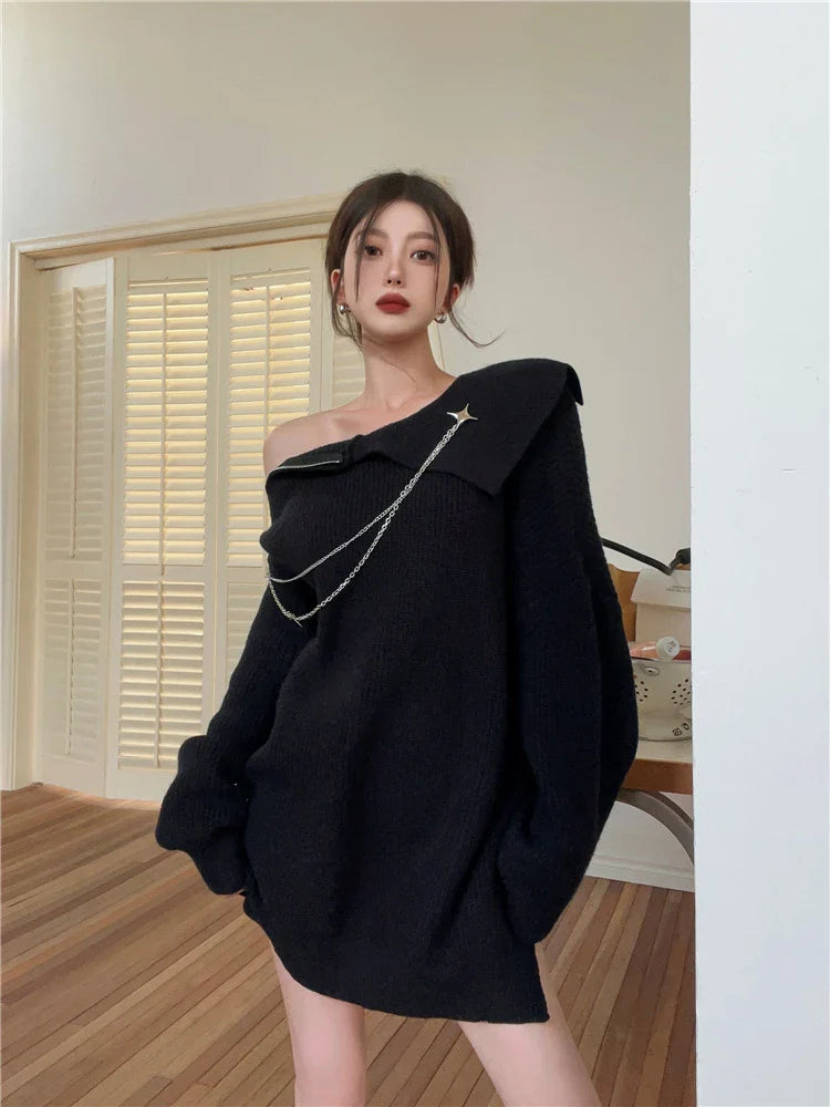 Luxurious off-the-shoulder zipper sweater in black and beige, featuring lantern sleeves and a cozy alpaca wool blend