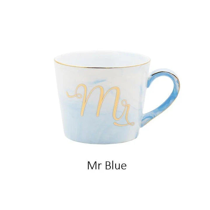Elegant marble-inspired porcelain coffee mug with a sleek and sophisticated British design