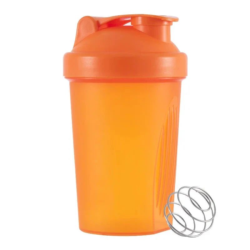 Premium protein shaker bottle with stainless steel whisk ball, BPA-free plastic, and leak-proof design for on-the-go fitness enthusiasts in the UK.