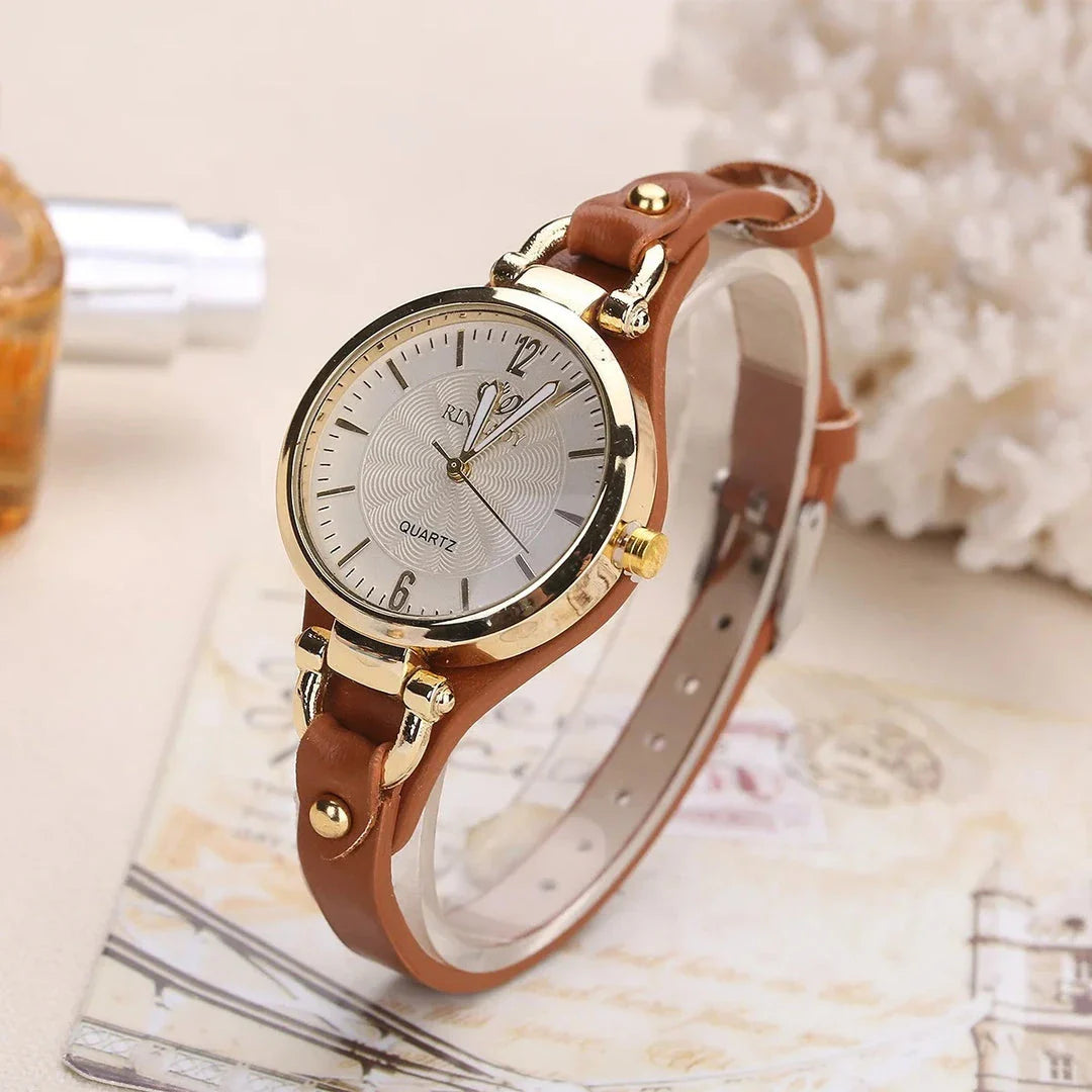 Elegant leather strap quartz watch with a sleek alloy case and durable glass dial for everyday elegance