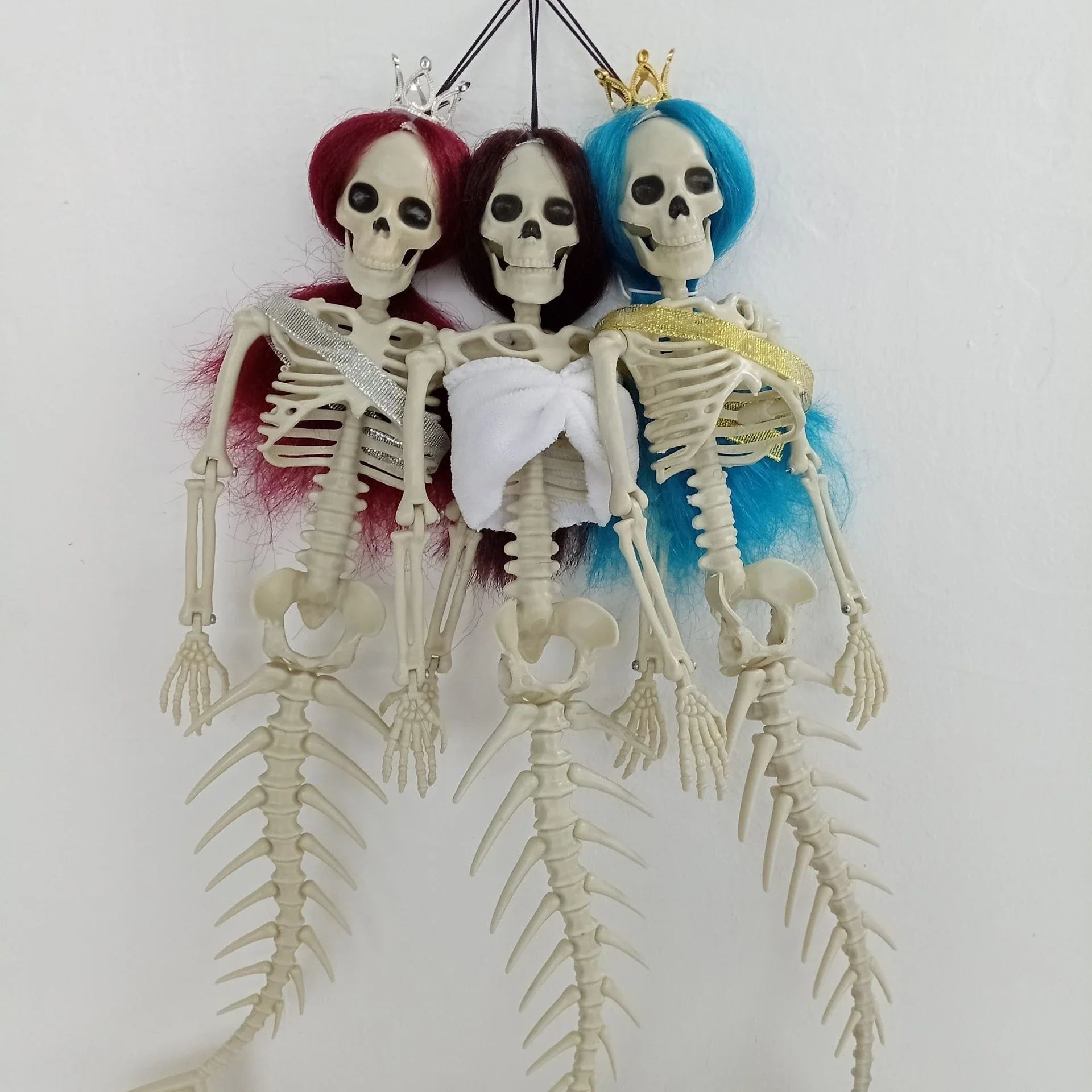 Mermaid bone pendant decoration in brown, dark purple, burgundy, and lake blue colours, ideal for Halloween outdoor courtyard displays