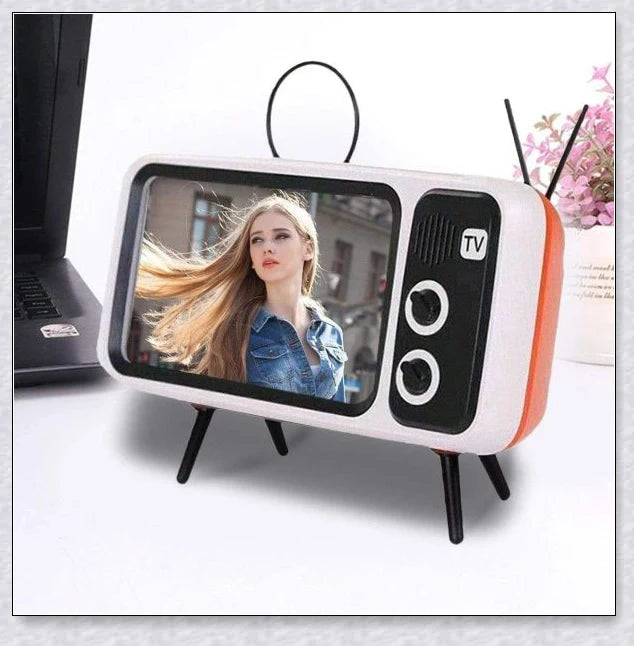 Retro TV-inspired phone stand with built-in Bluetooth speaker for hands-free entertainment and music playback