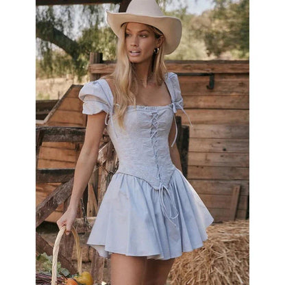 Elegant puff sleeve mini dress with square collar, backless design, and A-line silhouette for modern British women
