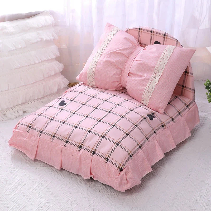 Cosy bow-accented pet bed with a detachable cushion, providing a luxurious and stylish sleeping retreat for small to medium-sized dogs and cats.