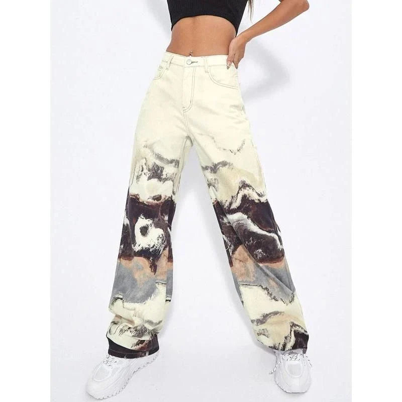 Stylish tie-dye wide-leg high-waist jeans in various sizes, featuring a unique colorblock design and premium denim fabric.