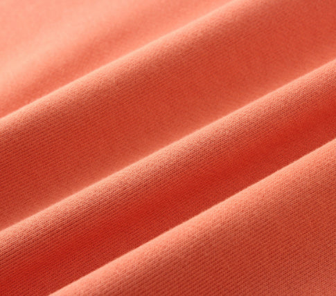 Premium heavyweight knitted jumper in a range of solid colours, made with soft cotton terry fabric for cosy comfort.
