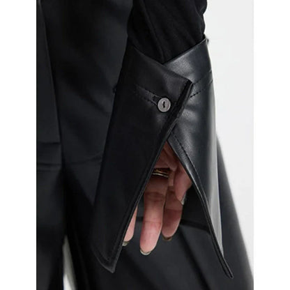 Chic knitted pullover with PU leather patchwork details, a versatile winter wardrobe essential.