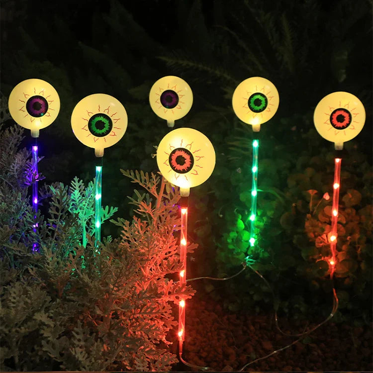 Colourful solar-powered Halloween eyeball garden lamp with weatherproof design