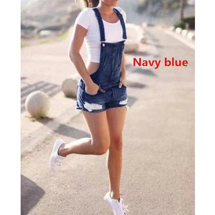 Premium British-made denim overalls shorts in classic blue hues, featuring adjustable suspenders for a tailored fit