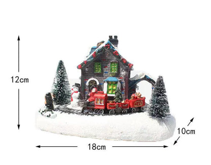 Luminous Christmas house decorations made of resin, with a warm glowing light creating a festive winter scene