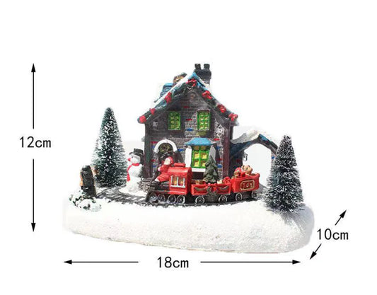 Luminous Christmas house decorations made of resin, with a warm glowing light creating a festive winter scene