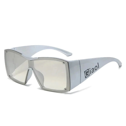 Oversized square sunglasses with black lenses and a durable plastic frame, offering UV400 protection and adaptive photochromic technology.