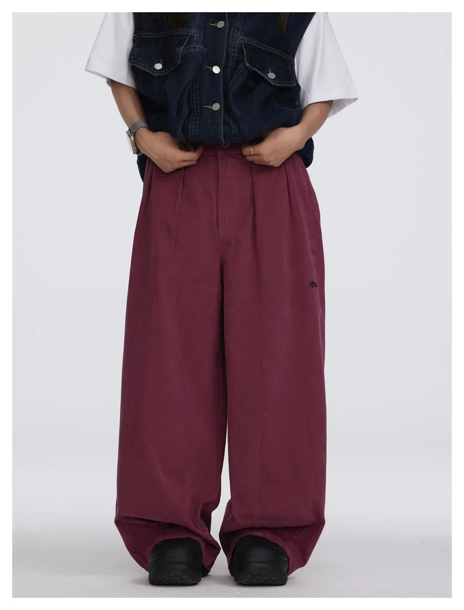 Sophisticated men's casual trousers in various colours, featuring a tailored straight-leg design and mid-rise waistline for a polished, British-inspired look.