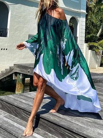 A chic inclined shoulder printed dress in a vibrant colour with a large, swinging skirt