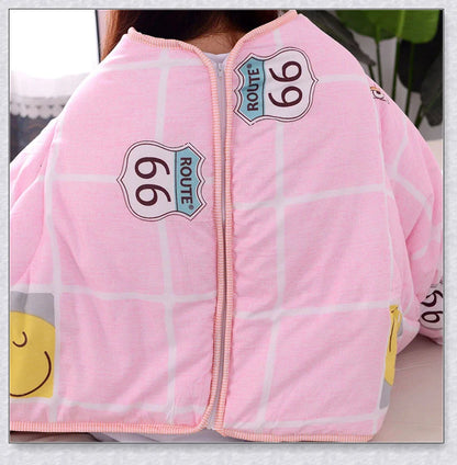 A cosy, wearable quilt with sleeves in a variety of colourful designs, perfect for staying warm and comfortable during the winter months.