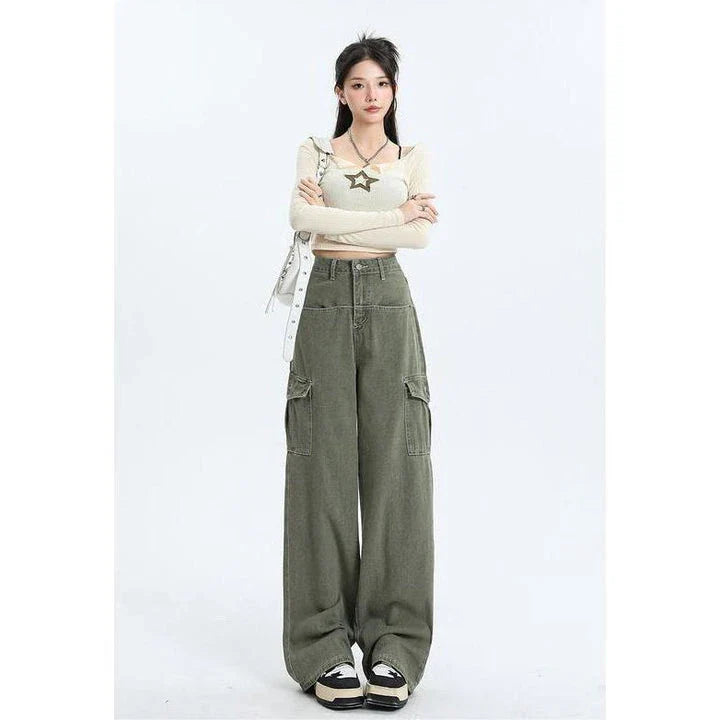A pair of pink high-waist baggy jeans with a straight-leg design, featuring vintage-inspired details like buttons and faux zippers.
