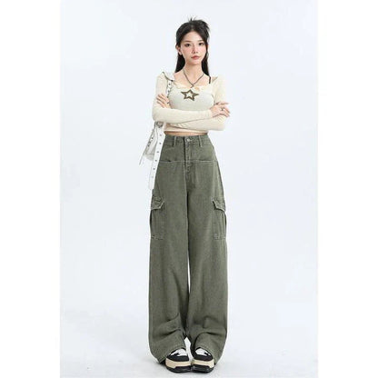 A pair of pink high-waist baggy jeans with a straight-leg design, featuring vintage-inspired details like buttons and faux zippers.