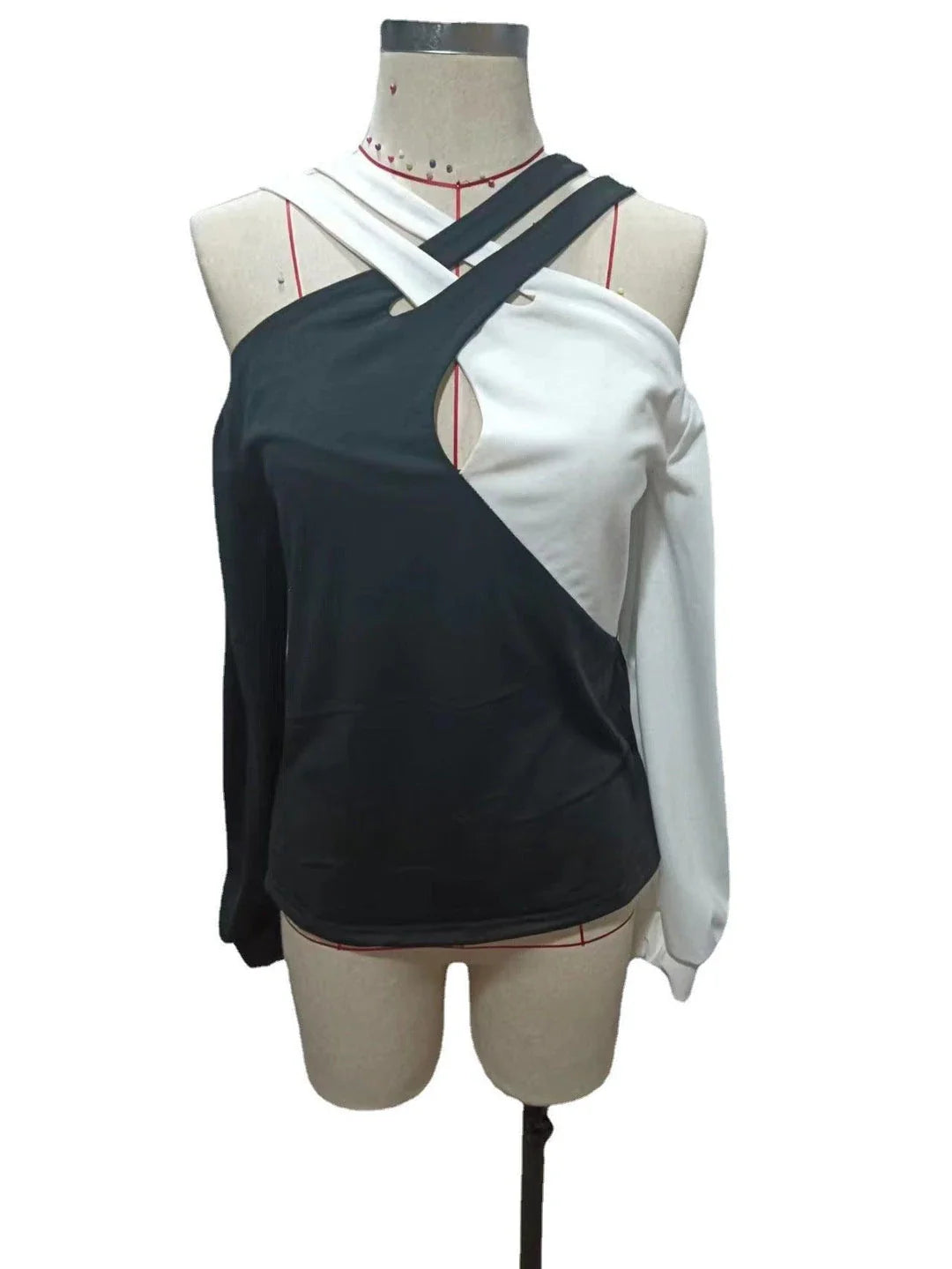 Premium patchwork blouse in black with a unique collage/splicing design, made from high-quality polyester for versatile style and comfort.
