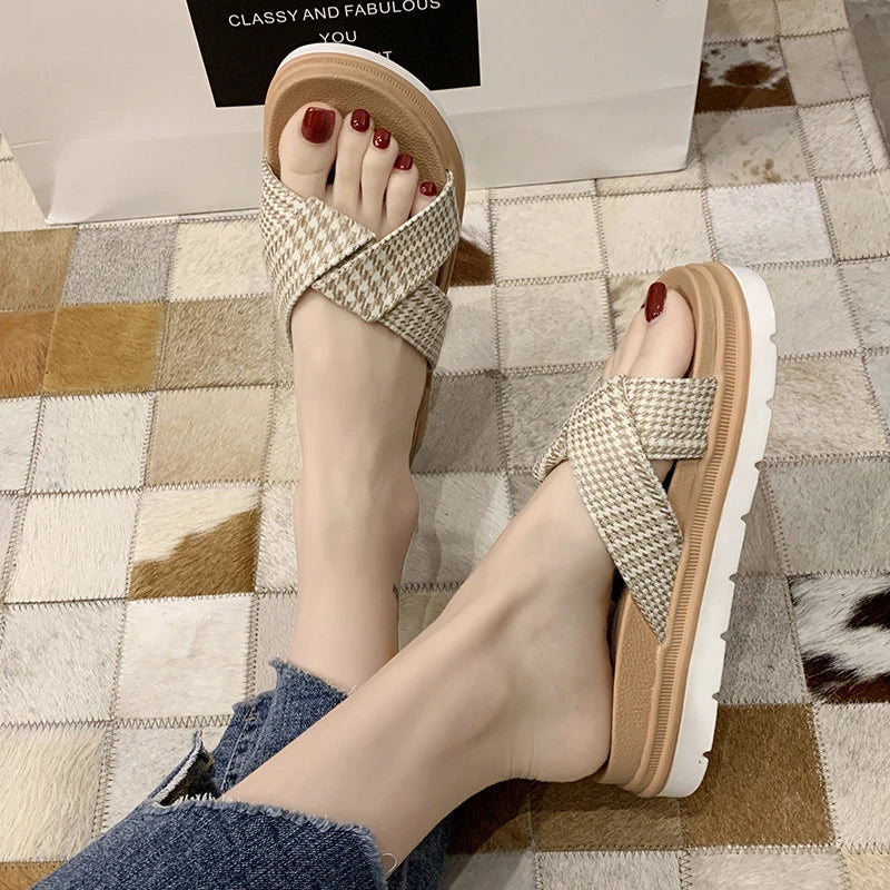 Premium non-slip herringbone slippers with a bow accent, featuring a canvas upper, fetal cowhide lining, and a rubber sole for comfort and stability.