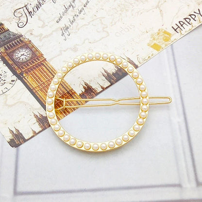 Elegant pearl hair clip with a sophisticated design, made of premium alloy materials for long-lasting durability and a secure fit.