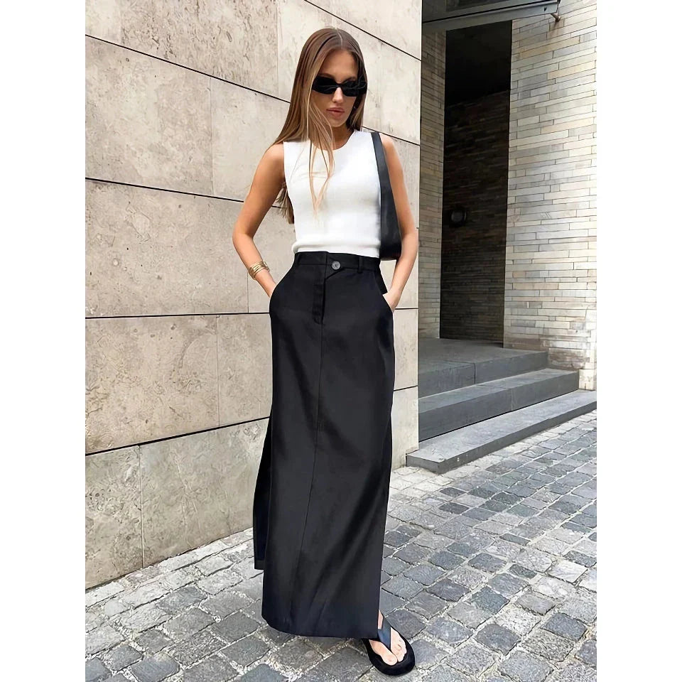 Elegant black ankle-length A-line skirt with pockets, made of high-quality polyester, spandex, and viscose blend fabric