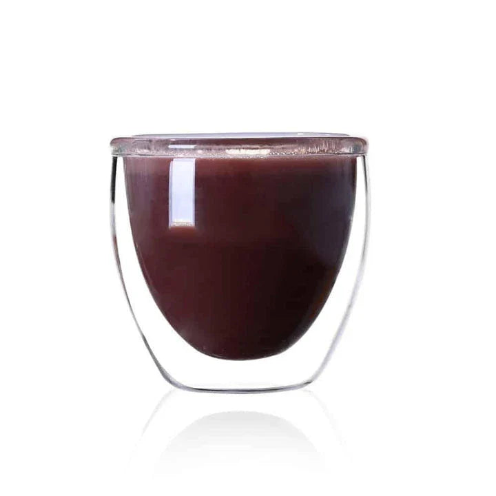 Stylish double-walled glass cup with elegant design, perfect for enjoying hot and cold drinks at the perfect temperature.