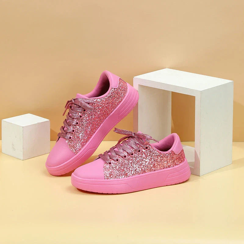 Glittering sequin flats with thick soles and lace-up closure in various vibrant colours