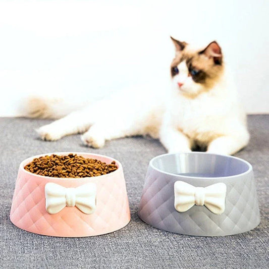 Stylish bowknot feeding bowl for pets, available in blue, grey, and pink colours