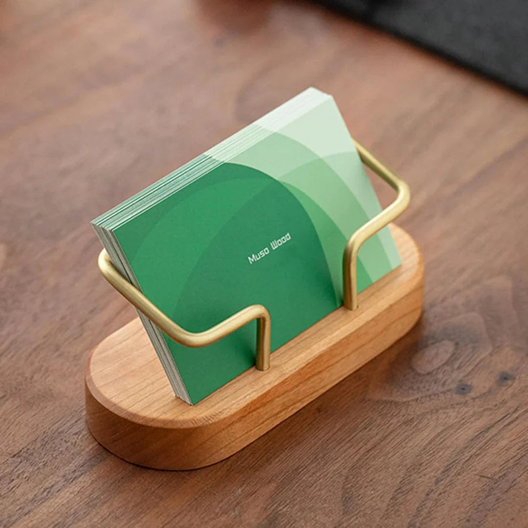 Elegant wooden business card holder made of premium black walnut or beech wood, designed for use on office desks and in home workspaces.
