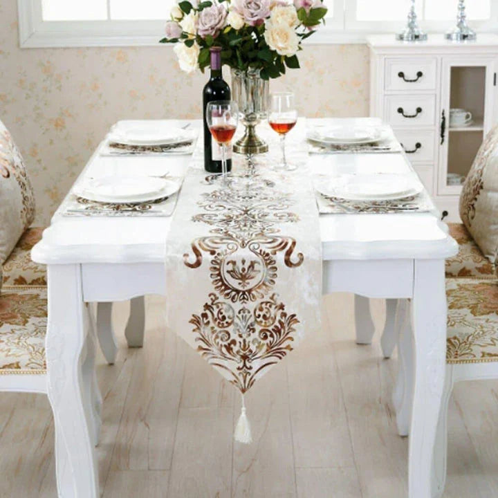 Elegant golden ornament table runner with intricate embroidery, adding a touch of regal charm to any dining setting.