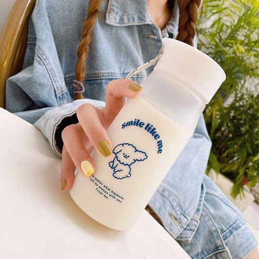 A frosted plastic water bottle with a cartoon dog design, perfect for everyday hydration and a fun, playful look.