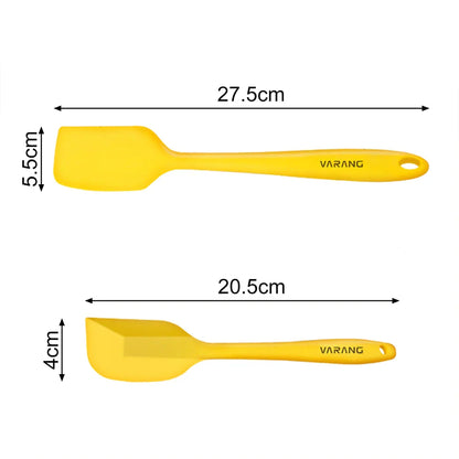 A set of two high-quality silicone spatulas in brown and yellow colours, designed for versatile cooking and baking tasks.