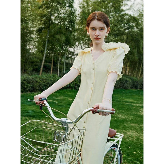 Elegant Navy Sailor Collar Dress with Signature Fungus-Edged Sleeves, a knee-length dress with a unique collar and delicate sleeve details