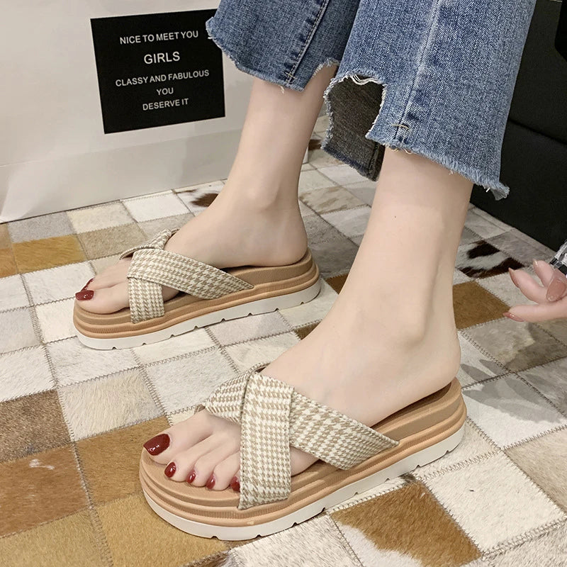 Premium non-slip herringbone slippers with a bow accent, featuring a canvas upper, fetal cowhide lining, and a rubber sole for comfort and stability.