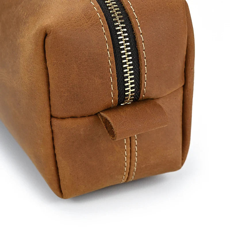 Premium leather clutch bag with multiple interior pockets, designed for the sophisticated British gentleman