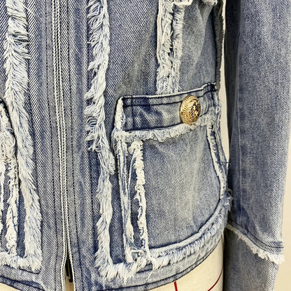 Trendha denim jacket with fringe stitching, lion head buckle, and slim-fit silhouette