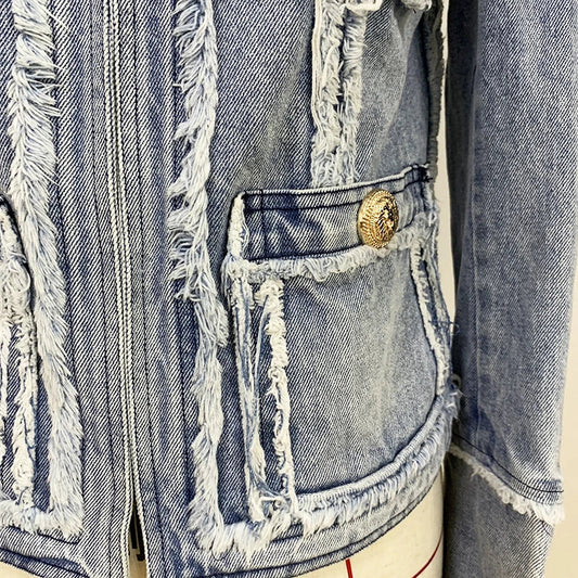 Trendha denim jacket with fringe stitching, lion head buckle, and slim-fit silhouette
