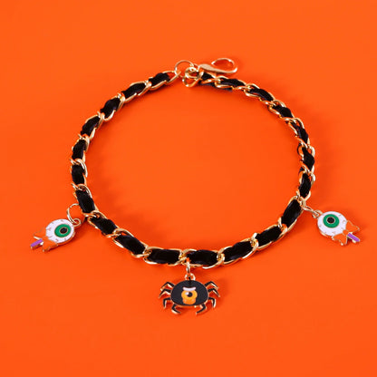 A pet collar made of premium velvet with metal bat charms, perfect for Halloween festivities