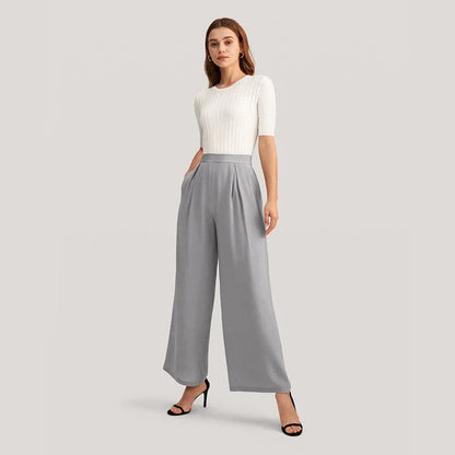 Exquisite grey silk wide-leg trousers with high-waisted design and relaxed fit for sophisticated style