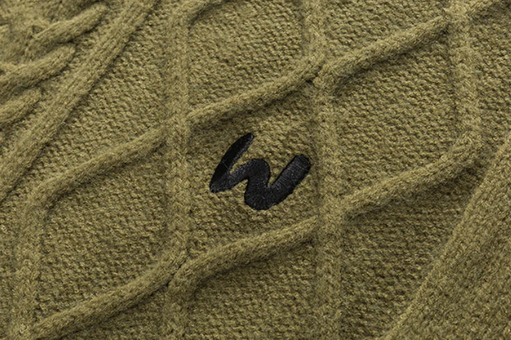 A premium men's knitted jumper in timeless colours, featuring a relaxed, flattering fit and soft, durable polyester fibre fabric for superior comfort and style.