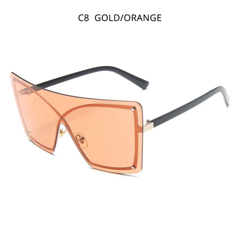 Fashionable oversized flat top sunglasses with gradient lenses and a sleek, rimless plastic frame