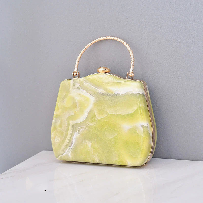 Premium marble-patterned crossbody bag for stylish ladies, featuring PU leather construction, roomy interior, and adjustable strap for hands-free carrying