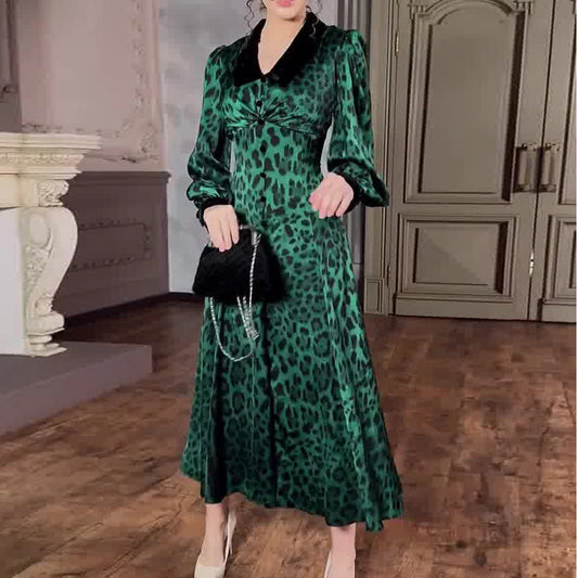 A stylish leopard print dress with a waist-trimming design, perfect for adding a touch of feline fierceness to your wardrobe.