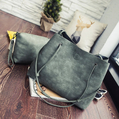 Stylish shoulder bag for modern mothers in the UK, featuring a premium PU leather design and versatile interior organisation
