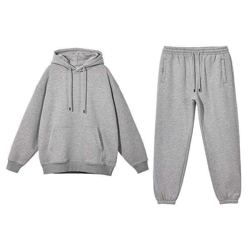 Cosy fleece hoodie and jogger set in light pink, grey, and navy blue colours for ultimate comfort and style