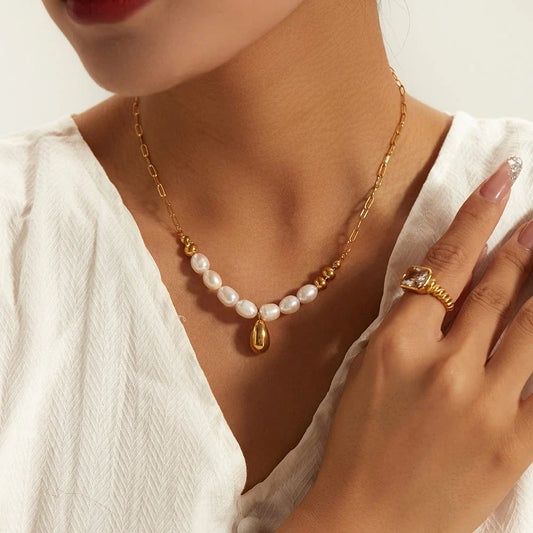 Elegant pearl pendant necklace with luxurious gold drop, a timeless accessory for any occasion